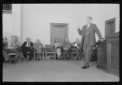 Untitled photo, possibly related to: President of bank speaking to a group of San Augustine county residents at a meeting held to discuss raising of funds to continue WPA (Work Projects Administration) roadwork, San Augustine, Texas