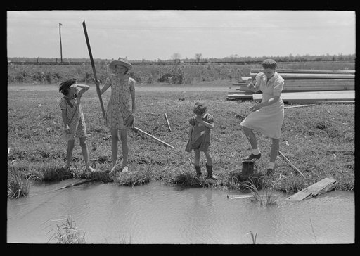 Untitled photo, possibly related to: Fishing for crawfish, Opelousas, Louisiana