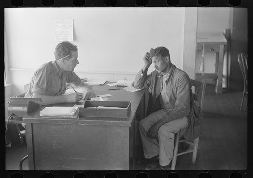 FSA (Farm Security Administration) client talking to supervisor, Sabine Farms, Marshall, Texas
