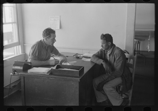 Untitled photo, possibly related to: FSA (Farm Security Administration) client talking to supervisor, Sabine Farms, Marshall, Texas