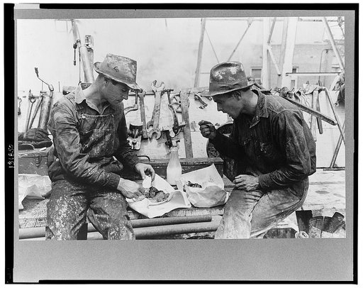 Oil field workers eating lunch, Kilgore, Texas