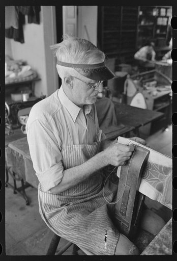 Untitled photo, possibly related to: Sewing uppers of boots together in bootmaking shop, Alpine, Texas