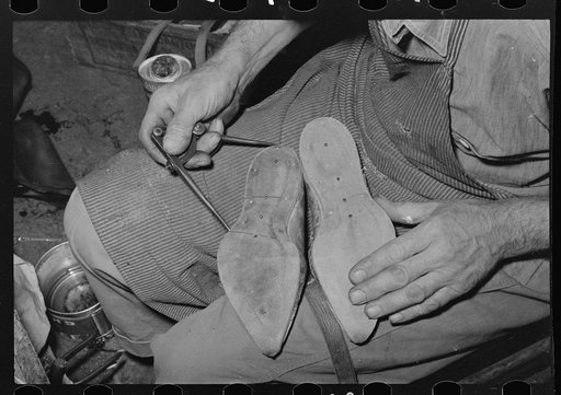 Calipering inner sole of boot to see if it matches pattern, Boot shop, Alpine, Texas