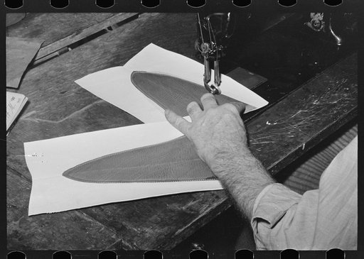 Sewing lining in piece of upper of boot. Bootmaking shop, Alpine, Texas