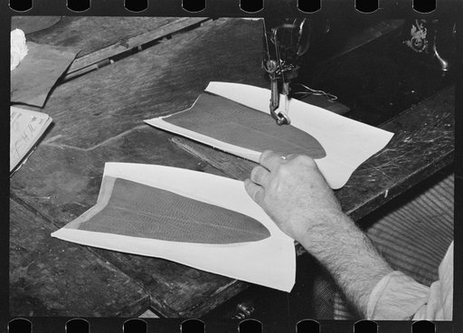 Untitled photo, possibly related to: Sewing lining in piece of upper of boot. Bootmaking shop, Alpine, Texas