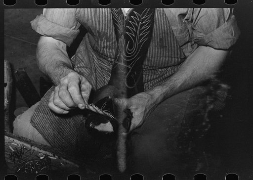 Untitled photo, possibly related to: Sewing cap into toe of boot. Cowboy bootmaking shop, Alpine, Texas