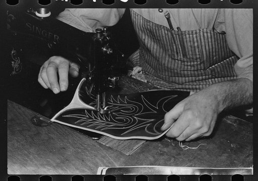Untitled photo, possibly related to: Sewing cap into toe of boot. Cowboy bootmaking shop, Alpine, Texas