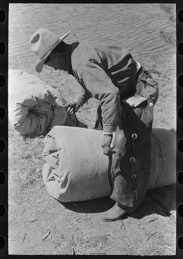 Tying the bedroll. Bunk of the cowboy on the range. Cattle ranch near Marfa, Texas