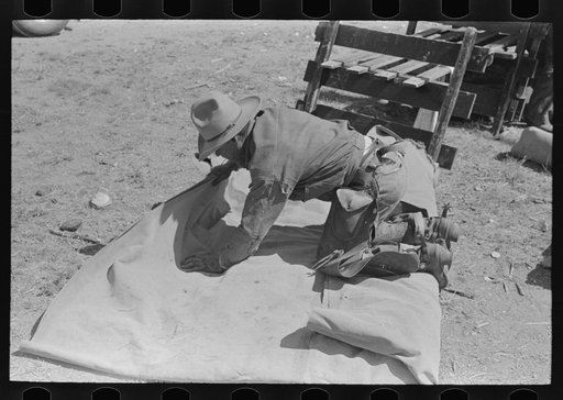 Tying the bedroll. Bunk of the cowboy on the range. Cattle ranch near Marfa, Texas
