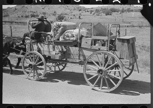 Untitled photo, possibly related to: Chuck and bedroll wagon of the tank gang on the highway. Near Marfa, Texas