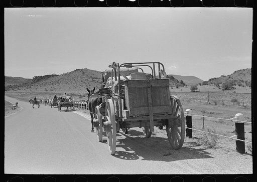 Untitled photo, possibly related to: Chuck and bedroll wagon of the tank gang on the highway. Near Marfa, Texas