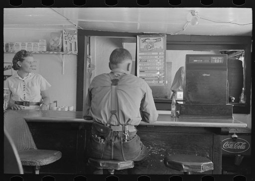 Man in hamburger stand, Alpine, Texas