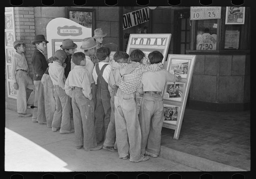 Children in front of moving picture show, Alpine, Texas