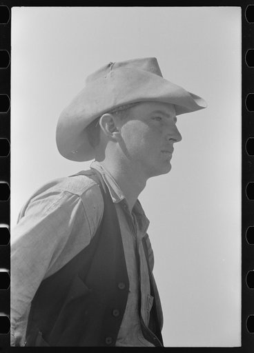 Cowboy on cattle ranch near Spur, Texas