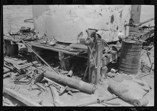 Detail of work bench and tractor supplies on four thousand nine hundred acre farm near Ralls, Texas