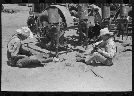 Untitled photo, possibly related to: Day laborers at work on tractor, large farm near Ralls, Texas