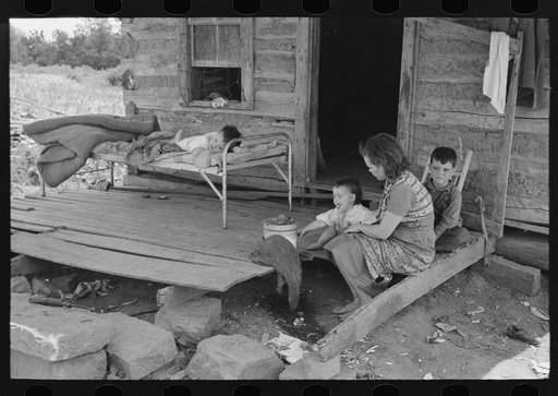 Front porch of tenant farmer's house near Warner, Oklahoma