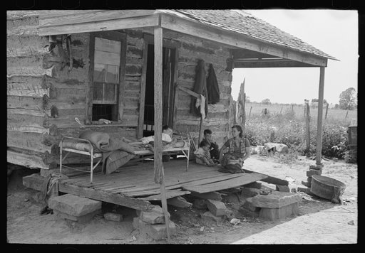 Front porch of tenant farmer's house near Warner, Oklahoma