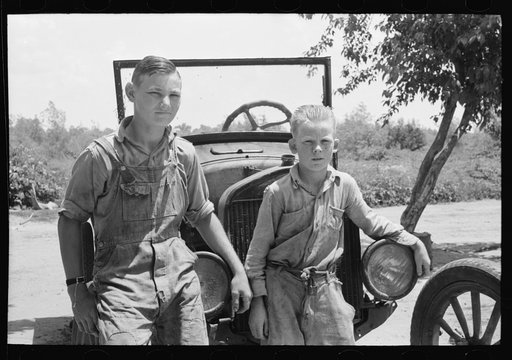 Sons of agricultural day laborer after washing up for dinner, near Webber Falls, Muskogee County, Oklahoma