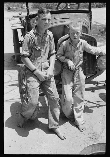 Sons of agricultural day laborer after washing up for dinner, near Webber Falls, Muskogee County, Oklahoma