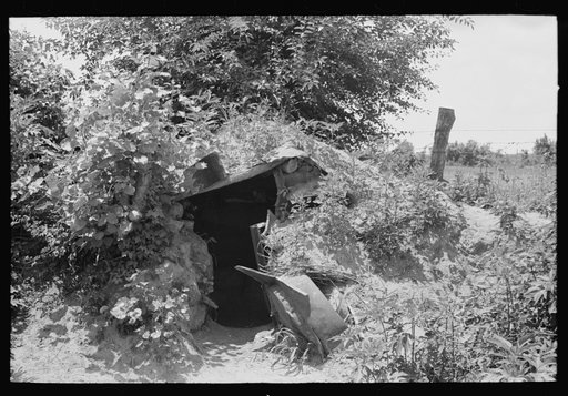 Untitled photo, possibly related to: Storm cellar of agricultural day laborer near Webber Falls, Muskogee County, Oklahoma