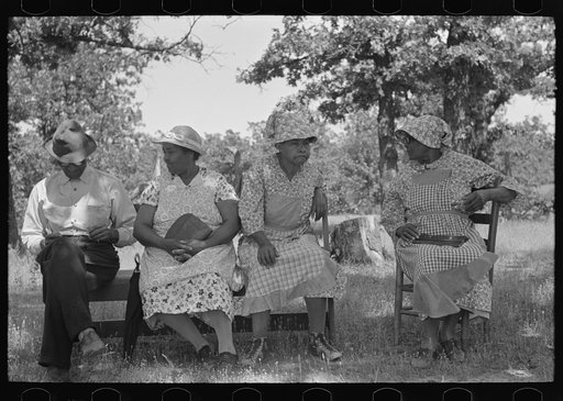 Negroes waiting outside a rural church while other members of their families are attending a church business meeting, McIntosh County, Oklahoma