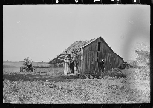 Untitled photo, possibly related to: Tractor plowing near abandoned and wrecked tenant house, Wagoner County, Oklahoma