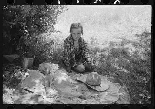 Girl of migrant family camped near Spiro. Sequoyah County, Oklahoma