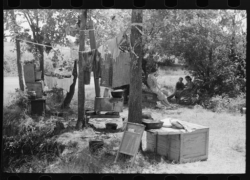 Untitled photo, possibly related to: Camp by the roadside near Spiro, Oklahoma. This family did agricultural day labor to obtain funds to go to Arizona and California. Sequoyah County, Oklahoma