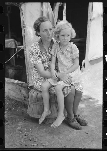 Mother and child of agricultural day laborers family encamped near Spiro. Sequoyah County, Oklahoma