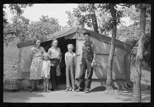 Family of agricultural day laborers living in tent near Spiro, Oklahoma. This family had farmed in this vicinity for twenty-five years but could no longer find a place to rent. They had no money and no car but hoped to get work in the potato fields and chopping cotton and picking roasting ears. They