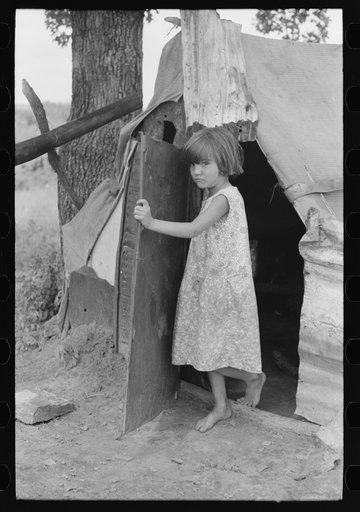 Child of agricultural day laborer coming out of tent near Spiro. Sequoyah County, Oklahoma