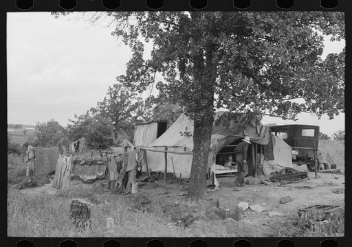 Camp of itinerant statue maker and agricultural day laborer on Poteau Creek near Spiro. Sequoyah County, Oklahoma