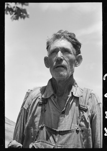 Veteran migrant agricultural worker. He has followed the road for about thirty years. When asked where his home was he said, "It's all over." He was camped in Wagoner County, Oklahoma