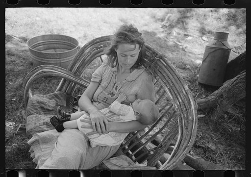 Wife and child of itinerant cane furniture maker and agricultural day laborer camped in Wagoner County, Oklahoma
