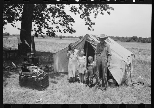 Veteran migrant agricultural worker and his family encamped on the Arkansas River, Wagoner County, Oklahoma