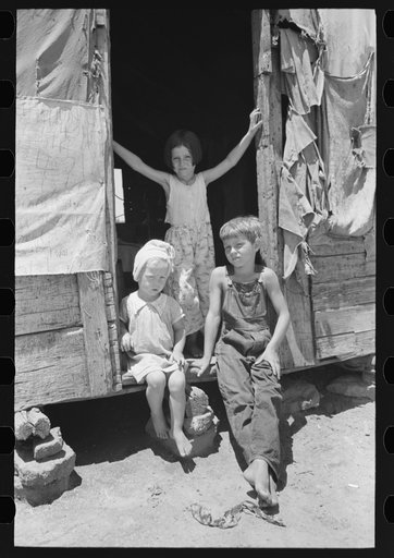 Children of agricultural day laborer who was picking up potatoes. The father, an oil field worker, had deserted the family. The shack was near Vian, Oklahoma