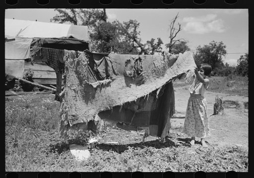 Bedding of agricultural workers' family near Vian, Sequoyah County, Oklahoma