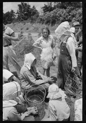 Local agricultural day laborers, potato workers, after a day's work near Spiro, Oklahoma