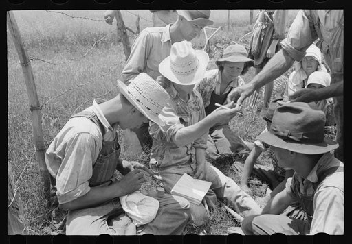 Paying off potato workers in field near Spiro, Oklahoma