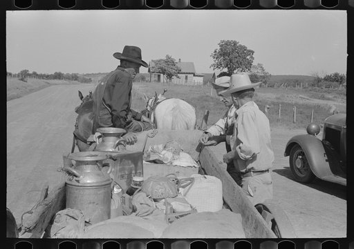 Untitled photo, possibly related to: White migrant family eating lunch of blackberry pie on the highway east of Fort Gibson, Muskogee County, Oklahoma