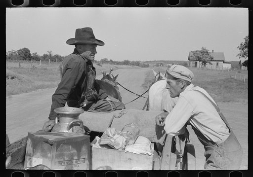 Farmers talking at crossroads grocery store in McIntosh County, Oklahoma