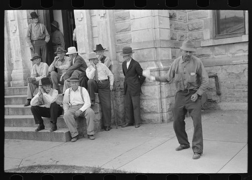 Group of residents of Weatherford, Texas, listening to politician speak