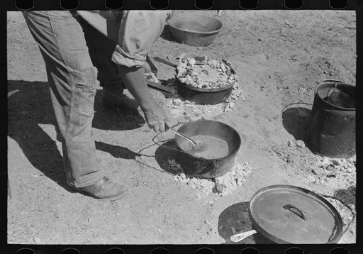 Ranch cook stirring chili. Roundup near Marfa, Texas