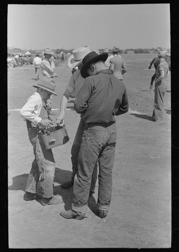 Cowboy buying a Coca-Cola, polo match, Abilene, Texas