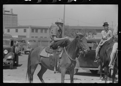 West Texan sitting on his pony while watching polo match at Abilene, Texas