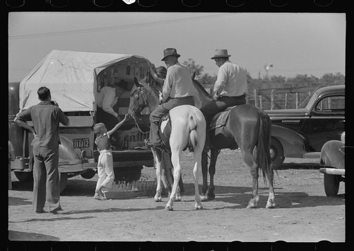 West Texans on their cow ponies buying soda pop at polo match, Abilene, Texas