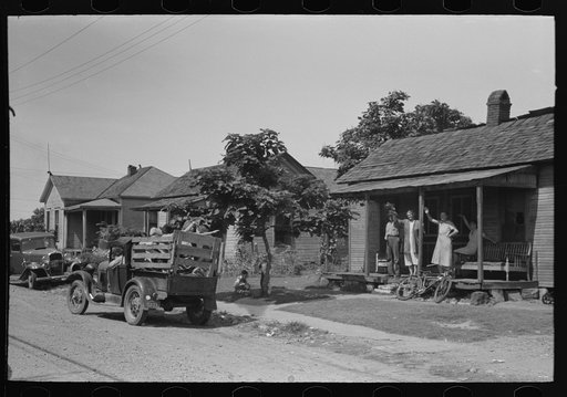Waving goodbye to migrant family bound for California, Muskogee, Oklahoma