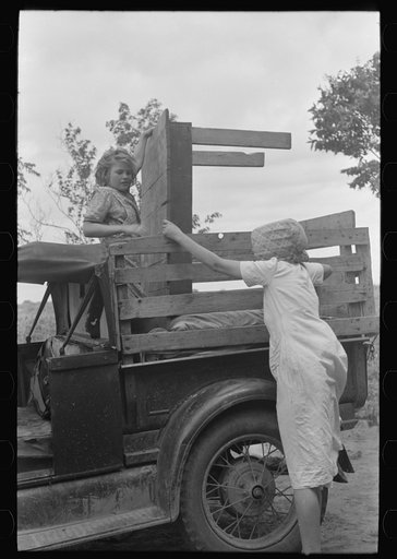 Loading truck with table which will be carried by this migrant family to California near Muskogee, Oklahoma
