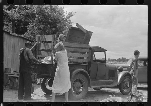 Untitled photo, possibly related to: Loading truck with table which will be carried by this migrant family to California near Muskogee, Oklahoma